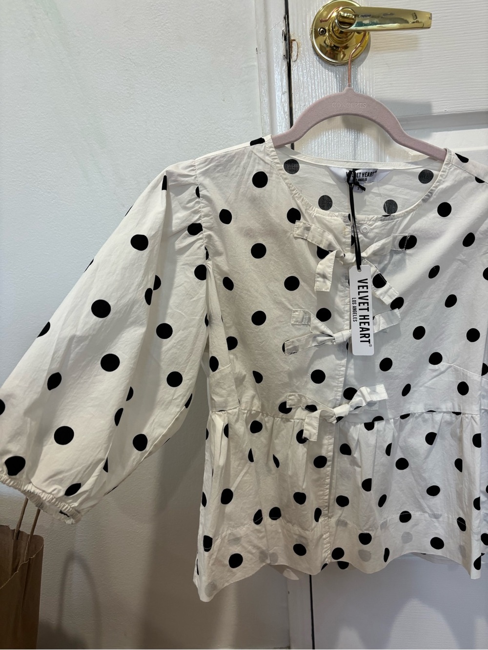 Velvet Heart White and Black Polka Dot Tie-Front Peplum Top - Picture 2 of 6